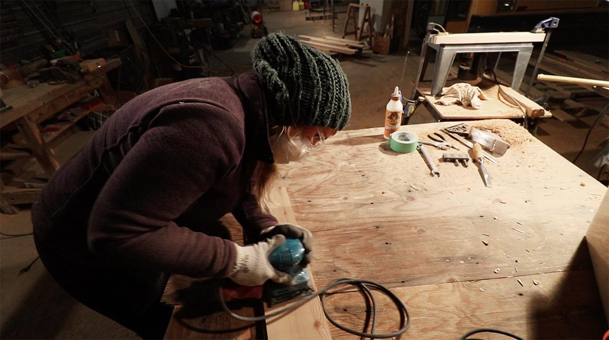 Sanding Smooth Reclaimed Wood Floor Planks